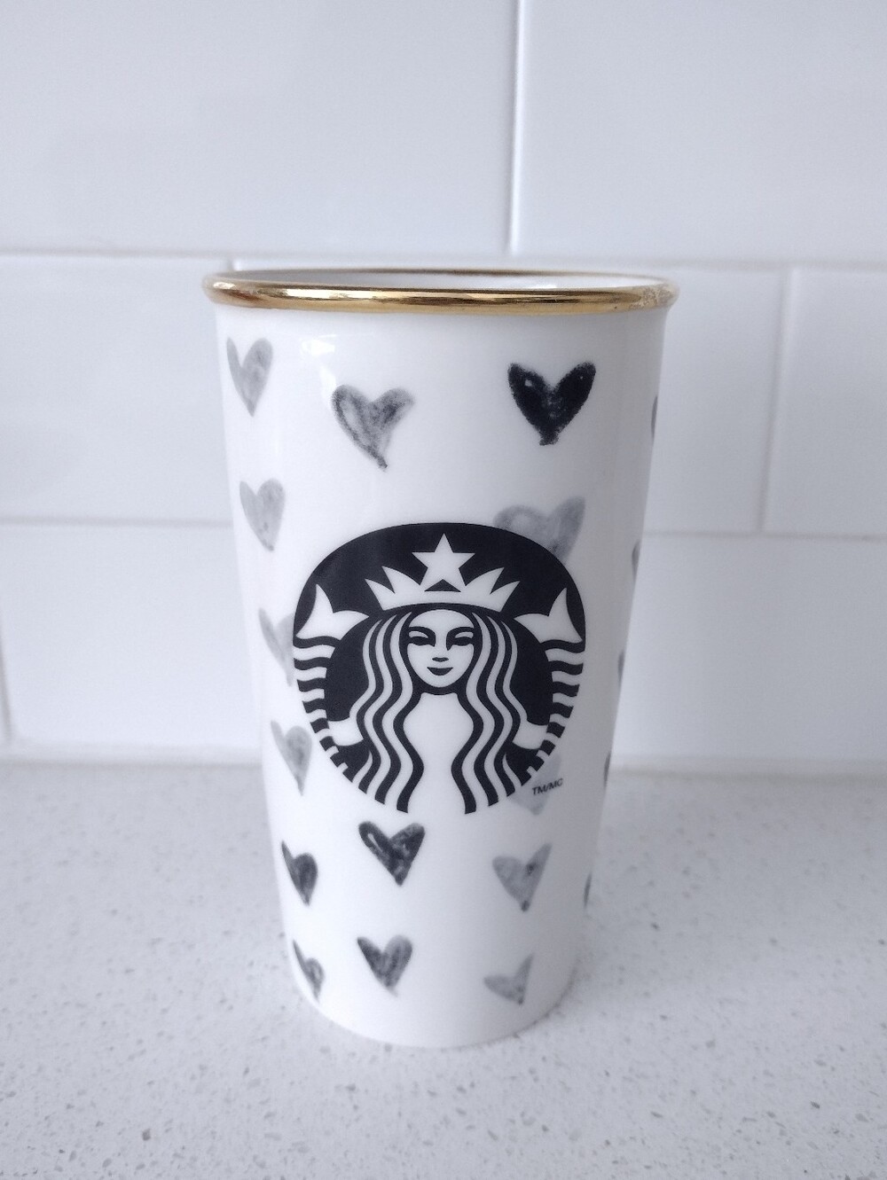 Starbucks White Ceramic Tumbler with Black Hearts and Logo with Gold Rim 12 oz